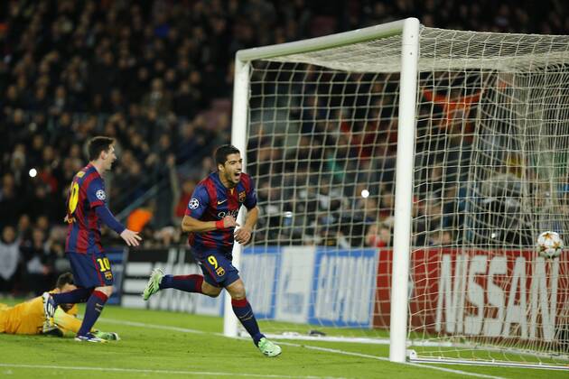 (141211) -- BARCELONA, Barcelona s Luis Suarez (R) celebrates scoring during the UEFA Champions League group F football match against Paris Saint-Germain in Barcelona, Spain, on Dec. 10, 2014. Barcelona won 3-1. ) (SP)SPAIN-BARCELONA-SOCCER-UEFA PauxBarrena 