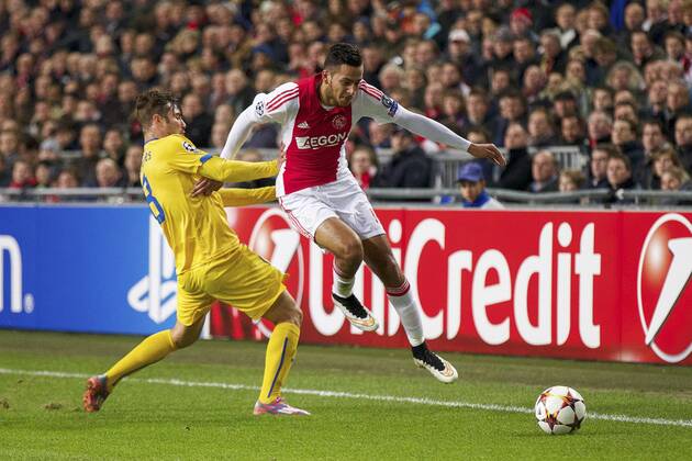 Aktuell Fussball, Champions League, Ajax Amsterdam - APOEL Nikosia (L-R) Tiago Gomes of Apoel FC, Ricardo Kishna of Ajax during the UEFA Champions League group F match between Ajax Amsterdam and Apoel Nicosia on December 10, 2014 at the Amsterdam Arena in Amsterdam, The Netherlands. Ajax Amsterdam v Apoel Nicosia UEFA Champions League Group F 2014 2015 xVIxxIVx 3345968