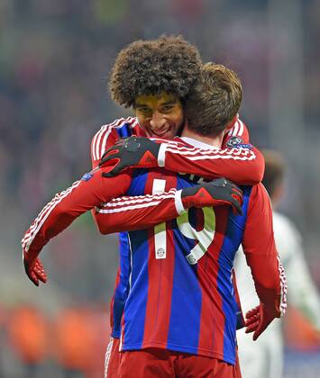 10.12.2014, Fussball Champions League 2014 2015, Vorrunde, 6.Spieltag, FC Bayern München - ZSKA Moskau, in der Allianzarena München. Torjubel. v.l. Dante (Bayern München) und Mario Götze (Bayern) 