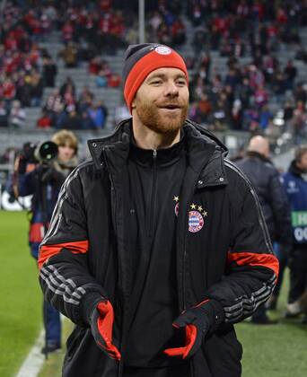 10.12.2014, Fussball Champions League 2014 2015, Vorrunde, 6.Spieltag, FC Bayern München - ZSKA Moskau, in der Allianzarena München. Xabi Alonso (Bayern München) ist zufrieden. 