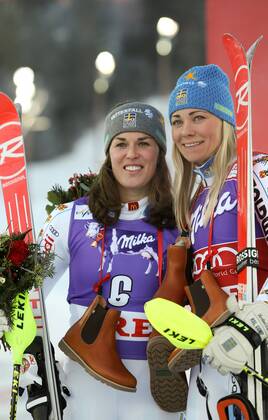 ALPINE SKIING - FIS WC Aare AARE,SWEDEN,13.DEC.14 - ALPINE SKIING - FIS World Cup, slalom, ladies, award ceremony. Image shows the rejoicing of Maria Pietilae-Holmner (SWE) and Frida Hansdotter (SWE).