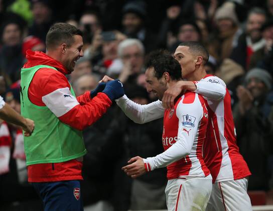 Arsenal s Santi Cazorla celebrates scoring his sides second goal Barclays Premier League- Arsenal FC vs Newcastle United - Emirates Stadium - England - 13th December 2014 - EDITORIAL USE ONLY. No use with unauthorised audio, video, data, fixture lists, club league logos or live services. Online in-match use limited to 120 images, no video emulation. No use in betting, games or single club league player publications.