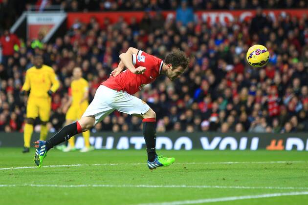 Juan Mata of Manchester United ManU scores his sides second goal - Manchester United vs. Liverpool - Barclay s Premier League - Old Trafford - Manchester - 14 12 2014 Pic Philip Oldham Sportimage EDITORIAL USE ONLY. No use with unauthorised audio, video, data, fixture lists, club league logos or live services. Online in-match use limited to 120 images, no video emulation. No use in betting, games or single club league player publications.