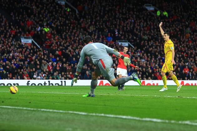Robin van Persie of Manchester United ManU scores his sides third goal - Manchester United vs. Liverpool - Barclay s Premier League - Old Trafford - Manchester - 14 12 2014 Pic Philip Oldham Sportimage EDITORIAL USE ONLY. No use with unauthorised audio, video, data, fixture lists, club league logos or live services. Online in-match use limited to 120 images, no video emulation. No use in betting, games or single club league player publications.