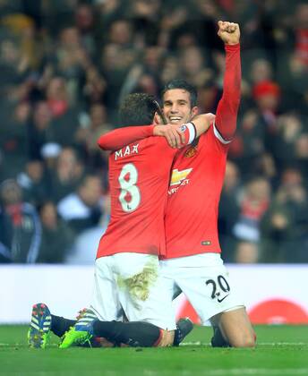 Aktuell Fußball, England, Premier League, Manchester United - FC Liverpool Robin van Persie of Manchester United ManU celebrates scoring his sides third goal - Manchester United vs. Liverpool - Barclay s Premier League - Old Trafford - Manchester - 14 12 2014 Pic Philip Oldham Sportimage EDITORIAL USE ONLY. No use with unauthorised audio, video, data, fixture lists, club league logos or live services. Online in-match use limited to 120 images, no video emulation. No use in betting, games or single club league player publications.