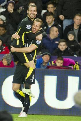 Football - 2014 2015 Premier League - Swansea City vs. Tottenham Hotspur Harry Kane of Tottenham Hotspurs celebrates scoring at The Liberty Stadium. COLORSPORT WINSTON BYNORTH