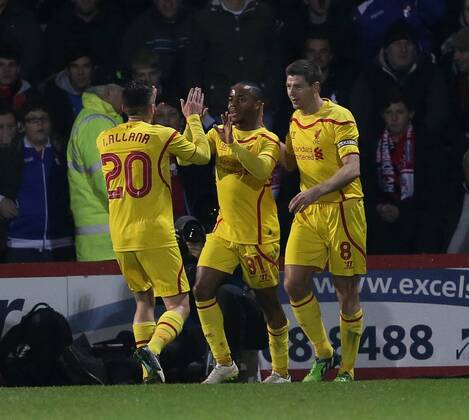 Liverpool s Raheem Sterling celebrates scoring his sides opening goal Capital One Cup- Bournemouth vs Liverpool - Goldsands Stadium - England - 17th December 2014 - Picture David Klein Sportimage EDITORIAL USE ONLY. No use with unauthorised audio, video, data, fixture lists, club league logos or live services. Online in-match use limited to 120 images, no video emulation. No use in betting, games or single club league player publications.