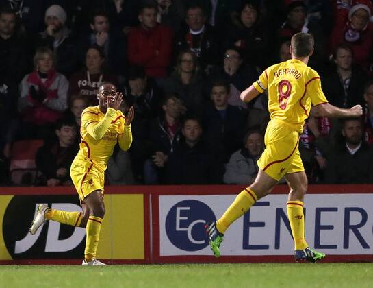 Liverpool s Raheem Sterling celebrates scoring his sides opening goal Capital One Cup- Bournemouth vs Liverpool - Goldsands Stadium - England - 17th December 2014 - Picture David Klein Sportimage EDITORIAL USE ONLY. No use with unauthorised audio, video, data, fixture lists, club league logos or live services. Online in-match use limited to 120 images, no video emulation. No use in betting, games or single club league player publications.
