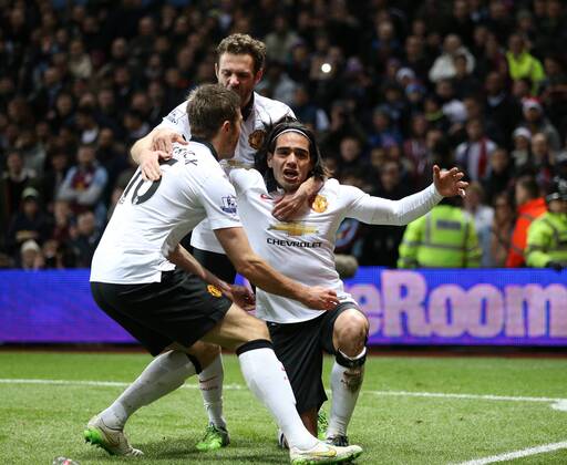 Manchester United ManU s Radamel Falcao celebrates scoring his sides opening goal Barclays Premier League - Aston Villa vs Manchester United - Villa Park - England - 19th December 2014 - Picture DavidKlein Sportimage EDITORIAL USE ONLY. No use with unauthorised audio, video, data, fixture lists, club league logos or live services. Online in-match use limited to 120 images, no video emulation. No use in betting, games or single club league player publications.