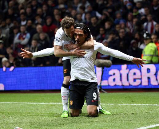 Manchester United ManU s Radamel Falcao celebrates scoring his sides opening goal Barclays Premier League - Aston Villa vs Manchester United - Villa Park - England - 19th December 2014 - Picture DavidKlein Sportimage EDITORIAL USE ONLY. No use with unauthorised audio, video, data, fixture lists, club league logos or live services. Online in-match use limited to 120 images, no video emulation. No use in betting, games or single club league player publications.