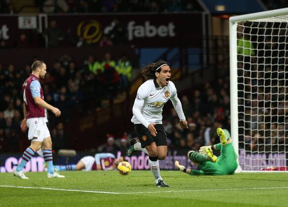 Manchester United ManU s Radamel Falcao celebrates scoring his sides opening goal Barclays Premier League - Aston Villa vs Manchester United - Villa Park - England - 19th December 2014 - Picture DavidKlein Sportimage EDITORIAL USE ONLY. No use with unauthorised audio, video, data, fixture lists, club league logos or live services. Online in-match use limited to 120 images, no video emulation. No use in betting, games or single club league player publications.
