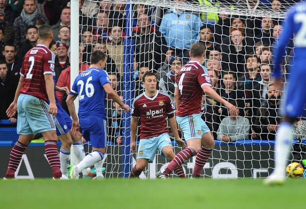 Football - 2014 2015 Premier League - Chelsea vs. West Ham United Chelsea s John Terry scores his first half goal at Stamford Bridge. COLORSPORT ANDREW COWIE