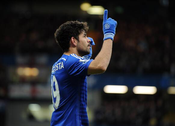 Diego Costa of Chelsea celebrates scoring his goal to make it 2-0 - Barclays Premier League - Chelsea vs West Ham United - Stamford Bridge Stadium - London - England - 26th December 2014 - Pic Robin Parker Sportimage EDITORIAL USE ONLY. No use with unauthorised audio, video, data, fixture lists, club league logos or live services. Online in-match use limited to 120 images, no video emulation. No use in betting, games or single club league player publications. DSC_3089