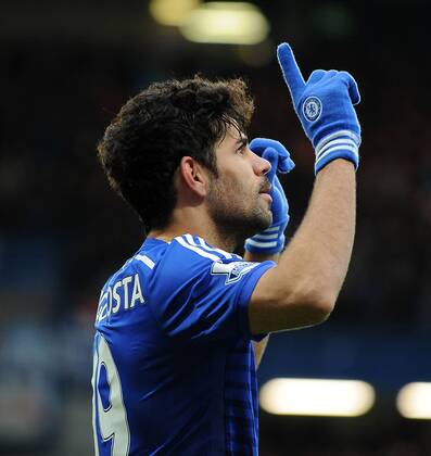 Diego Costa of Chelsea celebrates scoring his goal to make it 2-0 - Barclays Premier League - Chelsea vs West Ham United - Stamford Bridge Stadium - London - England - 26th December 2014 - Pic Robin Parker Sportimage EDITORIAL USE ONLY. No use with unauthorised audio, video, data, fixture lists, club league logos or live services. Online in-match use limited to 120 images, no video emulation. No use in betting, games or single club league player publications. DSC_3090