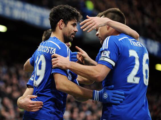 Diego Costa of Chelsea celebrates scoring his goal to make it 2-0 with team mate John Terry of Chelsea - Barclays Premier League - Chelsea vs West Ham United - Stamford Bridge Stadium - London - England - 26th December 2014 - Pic Robin Parker Sportimage EDITORIAL USE ONLY. No use with unauthorised audio, video, data, fixture lists, club league logos or live services. Online in-match use limited to 120 images, no video emulation. No use in betting, games or single club league player publications. DSC_3081