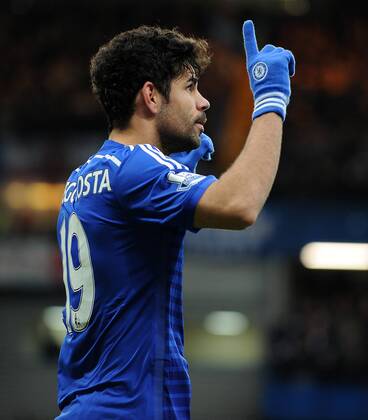 Diego Costa of Chelsea celebrates scoring his goal to make it 2-0 - Barclays Premier League - Chelsea vs West Ham United - Stamford Bridge Stadium - London - England - 26th December 2014 - Pic Robin Parker Sportimage EDITORIAL USE ONLY. No use with unauthorised audio, video, data, fixture lists, club league logos or live services. Online in-match use limited to 120 images, no video emulation. No use in betting, games or single club league player publications. DSC_3088