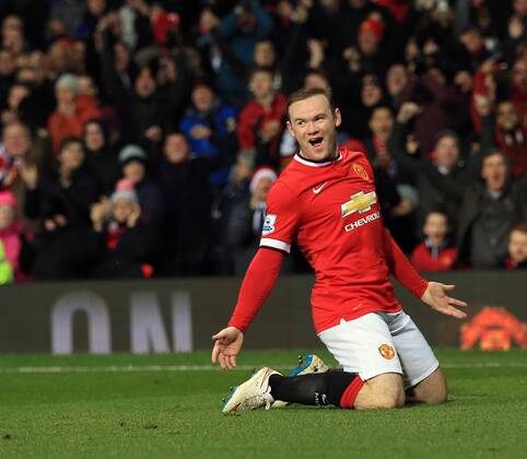 Manchester United ManU s Wayne Rooney celebrates scoring his sides second goal Barclays Premier League - Manchester United vs Newcastle United - Old Trafford - England - 26th December 2014 - Picture David Klein Sportimage EDITORIAL USE ONLY. No use with unauthorised audio, video, data, fixture lists, club league logos or live services. Online in-match use limited to 120 images, no video emulation. No use in betting, games or single club league player publications.