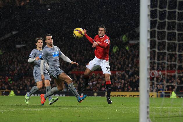 Manchester United ManU s Robin Van Persie scoring his sides third goal Barclays Premier League - Manchester United vs Newcastle United - Old Trafford - England - 26th December 2014 - Picture David Klein Sportimage EDITORIAL USE ONLY. No use with unauthorised audio, video, data, fixture lists, club league logos or live services. Online in-match use limited to 120 images, no video emulation. No use in betting, games or single club league player publications.