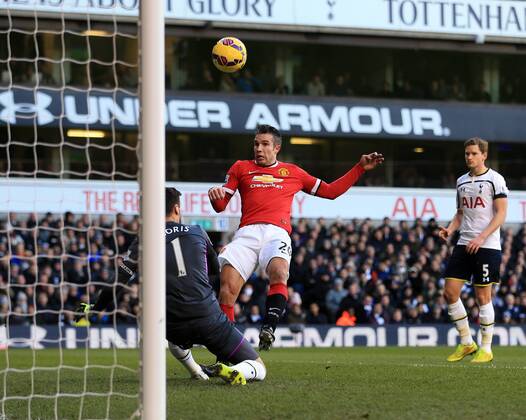 Tottenham s Hugo Lloris saves from Manchester United ManU s Robin Van Persie Barclays Premier League - Tottenham Hotspur vs Manchester United - White Hart Lane - England - 28th December 2014 - Picture David Klein Sportimage EDITORIAL USE ONLY. No use with unauthorised audio, video, data, fixture lists, club league logos or live services. Online in-match use limited to 120 images, no video emulation. No use in betting, games or single club league player publications.