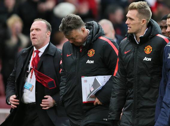 Louis van Gaal manager of Manchester United ManU looks down at the ground as he walks off - Barclays Premier League - Stoke City vs Manchester Utd - Stoke - England - 1st January 2015 - Picture Simon Bellis Sportimage EDITORIAL USE ONLY. No use with unauthorised audio, video, data, fixture lists, club league logos or live services. Online in-match use limited to 120 images, no video emulation. No use in betting, games or single club league player publications.