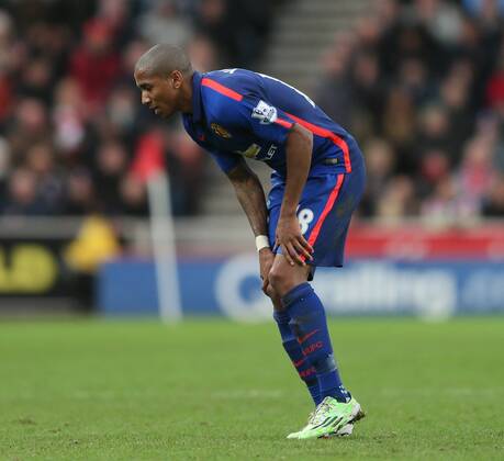 Ashley Young of Manchester United ManU pulls up and holds the back of his thigh - Barclays Premier League - Stoke City vs Manchester Utd - Stoke - England - 1st January 2015 - Picture Simon Bellis Sportimage EDITORIAL USE ONLY. No use with unauthorised audio, video, data, fixture lists, club league logos or live services. Online in-match use limited to 120 images, no video emulation. No use in betting, games or single club league player publications.