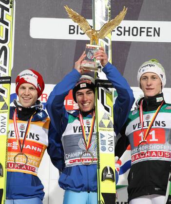 NORDIC SKIING - FIS WC Bischofshofen, Four Hills Tournament BISCHOFSHOFEN,AUSTRIA,06.JAN.15 - NORDIC SKIING, Ski jumping Skispringen Ski nordisch - FIS World Cup, Four Hills Tournament, large hill, men. Image shows Tagessieger Michael Hayboeck (Sieg), Tourneesieger Stefan Kraft (Sieg, Tourneesieg) (AUT) and Peter Prevc (SLO).