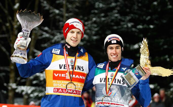 NORDIC SKIING - FIS WC Bischofshofen, Four Hills Tournament BISCHOFSHOFEN,AUSTRIA,06.JAN.15 - NORDIC SKIING, Ski jumping Skispringen Ski nordisch - FIS World Cup, Four Hills Tournament, large hill, men. Image shows the rejoicing of Tagessieger Michael Hayboeck (Sieg) and Tourneesieger Stefan Kraft (Sieg, Tourneesieg) (AUT). Keywords: Four Hills Tournament Trophy.