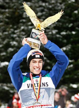 NORDIC SKIING - FIS WC Bischofshofen, Four Hills Tournament BISCHOFSHOFEN,AUSTRIA,06.JAN.15 - NORDIC SKIING, Ski jumping Skispringen Ski nordisch - FIS World Cup, Four Hills Tournament, large hill, men. Image shows the rejoicing of Tourneesieger Stefan Kraft (Sieg, Tourneesieg) (AUT). Keywords: Four Hills Tournament Trophy.