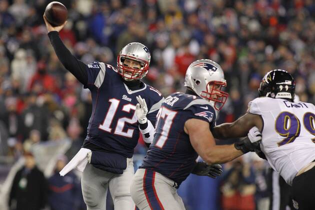 New England Patriots quarterback Tom Brady (12) throws a pass in the second quarter of the AFC Divisional Playoff game against the Baltimore Ravens at Gillette Stadium in Foxborough, Massachusetts on January 10, 2015. Photo by Matthew Healey UPI  BOS2015011008 MATTHEWxHEALEY