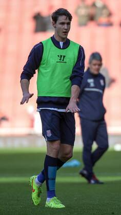 Football - 2014 2015 - Barclays Premier League, - Arsenal Vs Stoke City, Stoke City s new signing Philipp Wollscheid warms up ahead of his Premier League debut at The Emirates Stadium COLORSPORT DANIEL BEARHAM ARS_STO