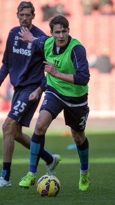 Football - 2014 2015 - Barclays Premier League, - Arsenal Vs Stoke City, Stoke City s new signing Philipp Wollscheid warms up ahead of his Premier League debut at The Emirates Stadium COLORSPORT DANIEL BEARHAM ARS_STO