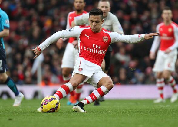 Football - 2014 2015 - Barclays Premier League, - Arsenal Vs Stoke City, Arsenal s Alexis Sanchez tries to chip the ball in from 30 yards at The Emirates Stadium ARS_STO