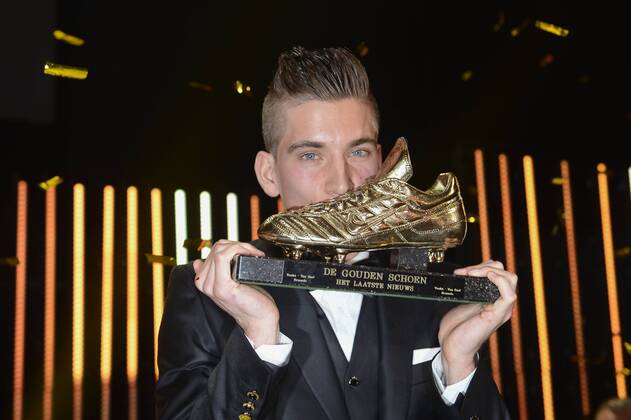 - LINT, BELGIUM: Anderlecht s Dennis Praet kisses his trophy after winning the 61th edition of the Golden Shoe award ceremony, Wednesday 14 January 2015, in Lint. The Golden Shoe (Gouden Schoen Soulier d Or) is an award for the best soccer player of the Belgian Jupiler Pro League championship during the calender year 2014. DIRKxWAEM  x04538245x