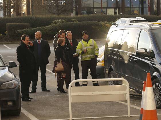 Nottingham Forest chairman Fawaz Al Hasawi (left) inspects damage to his car following the game, during which all four tyres were slashed - Football - Sky Bet Championship - Derby County vs Nottingham Forest - I-Pro Stadium Derby - Season 2014 2015 - 17th January 2015 - EDITORIAL USE ONLY. No use with unauthorised audio, video, data, fixture lists, club league logos or live services. Online in-match use limited to 120 images, no video emulation. No use in betting, games or single club league player publications.