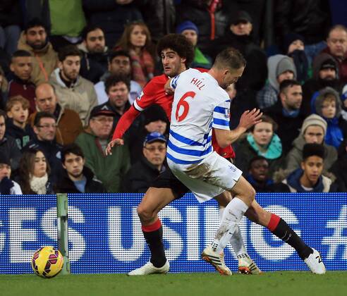 QPR s Clint Hill tussles with Manchester United ManU s Marouane Fellaini Barclays Premier League - Queens Park Rangers vs Manchester United - Loftus Road - England - 17th January 2015 - Picture David Klein Sportimage EDITORIAL USE ONLY. No use with unauthorised audio, video, data, fixture lists, club league logos or live services. Online in-match use limited to 120 images, no video emulation. No use in betting, games or single club league player publications.