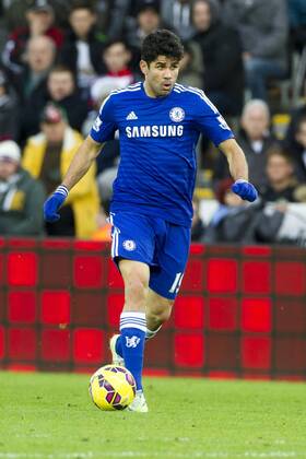 Football - 2014 2015 Premier League - Swansea City vs. Chelsea Diego Costa of Chelsea attacks at The Liberty Stadium. COLORSPORT WINSTON BYNORTH
