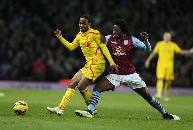 Raheem Sterling of Liverpool tussles with Aly Cissokho of Aston Villa - Barclays Premier League - Aston Villa vs Liverpool - Villa Park Stadium - Birmingham - England - 17th January 2015 - Picture Simon Bellis Sportimage EDITORIAL USE ONLY. No use with unauthorised audio, video, data, fixture lists, club league logos or live services. Online in-match use limited to 120 images, no video emulation. No use in betting, games or single club league player publications.