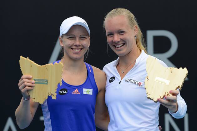 Jan 17, 2015 - Hobart, Tasmania, Australia - Doubles champs JOHANNA LARSSON of Sweden (left) and KIKI BERTENS of The Netherlands (right) pose with their trophies after winning the Hobart International Tennis tournament at the Domain Tennis Centre. Tennis 2015 - Hobart International - Day 7 - ZUMAl132