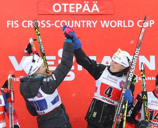 NORDIC SKIING - FIS WC Otepaeae OTEPAEAE,ESTONIA,18.JAN.15 - NORDIC SKIING, CROSS COUNTRY SKIING - FIS World Cup, team sprint, ladies, award ceremony. Image shows Stina Nilsson and Ida Ingemarsdotter (SWE).