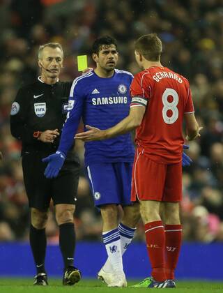 Aktuell Fußball, England, Capital One Cup, FC Liverpool - FC Chelsea Yellow card for Steven Gerrard of Liverpool - Capital One Cup - Semi Final First Leg - Liverpool vs Chelsea - Anfield Stadium - Liverpool - England - 20th January 2015 - Picture Simon Bellis Sportimage EDITORIAL USE ONLY. No use with unauthorised audio, video, data, fixture lists, club league logos or live services. Online in-match use limited to 120 images, no video emulation. No use in betting, games or single club league player publications.