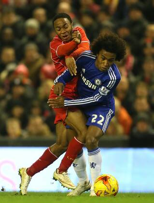 Raheem Sterling of Liverpool tussles with Willian of Chelsea - Capital One Cup - Semi Final First Leg - Liverpool vs Chelsea - Anfield Stadium - Liverpool - England - 20th January 2015 - Picture Simon Bellis Sportimage EDITORIAL USE ONLY. No use with unauthorised audio, video, data, fixture lists, club league logos or live services. Online in-match use limited to 120 images, no video emulation. No use in betting, games or single club league player publications.