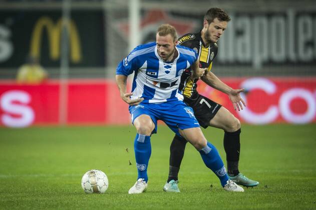 - GENT, BELGIUM: Gent s Laurent Depoitre and Lokeren s Killian Overmeire fight for the ball during a soccer game between KAA Gent and Sporting Lokeren, the return match in the 1 4th final of the Cofidis Cup, Wednesday 21 January 2015 in Gent. JASPERxJACOBS x04551474x