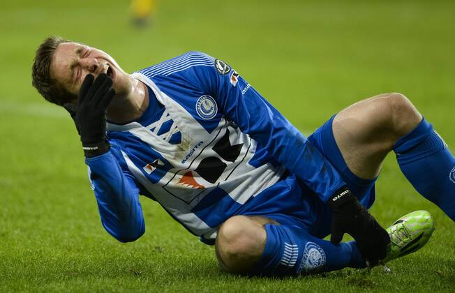 - GENT, BELGIUM: Gent s Brecht Dejaegere lies injured on the ground during the Jupiler Pro League match between KAA Gent and KV Oostende, in Gent, Sunday 25 January 2015, on day 23 of the Belgian soccer championship. LAURIExDIEFFEMBACQ x04556309x