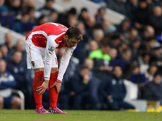 Arsenal s Mesut Ozil looks on dejected Barclays Premier League- Tottenham Hotspurs vs Arsenal - White Hart Lane - England - 7th February 2015 - Picture David Klein Sportimage EDITORIAL USE ONLY. No use with unauthorised audio, video, data, fixture lists, club league logos or live services. Online in-match use limited to 120 images, no video emulation. No use in betting, games or single club league player publications.