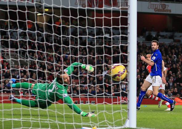 Arsenal s Theo Walcott scoring his sides second goal Barclays Premier League- Arsenal vs Leicester City - Emirates Stadium - England - 10th February 2015 - Picture David Klein Sportimage EDITORIAL USE ONLY. No use with unauthorised audio, video, data, fixture lists, club league logos or live services. Online in-match use limited to 120 images, no video emulation. No use in betting, games or single club league player publications.