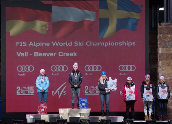 12.02.2015, Solaris Placa, Vail, USA, FIS Weltmeisterschaften Ski Alpin, Damen, Riesenslalom, Siegerehrung, im Bild Viktoria Rebensburg (GER, 2. Platz), Anna Fenninger (AUT, 1. Platz), Jessica Lindell-Vikarby (SWE, 3. Platz), Tina Weirather (LIE), Tina Maze (SLO), Michaela Kirchgasser (AUT) second placed Viktoria Rebensburg of Germany, first placed Anna Fenninger of Austria , third placed Jessica Lindell-Vikarby of Sweden, Tina Weirather of Lichtenstein, Tina Maze of Slovenia, Michaela Kirchgasser of Austria celebrates on podium during the award ceremony for the ladie s Giant Slalom of FIS Ski World Championships 2015 at the Solaris Placa in Vail, United States on 2015 02 12. EX_GRO
