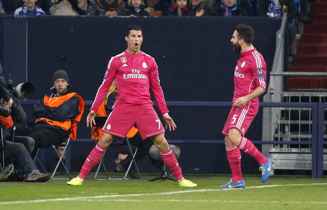 Cristiano Ronaldo (Real Madrid) (L) celebrates scoring the 1:0 with Daniel Carvajal (Real Madrid) during the Championsleague match between FC Schalke 04 and Real Madrid, Veltins Arena in Gelsenkirchen on February 18., 2015. FC Schalke 04 vs. Real Madrid im Achtelfinale der Champions League der Saison 2014 2015 am 18. Februar 2015.