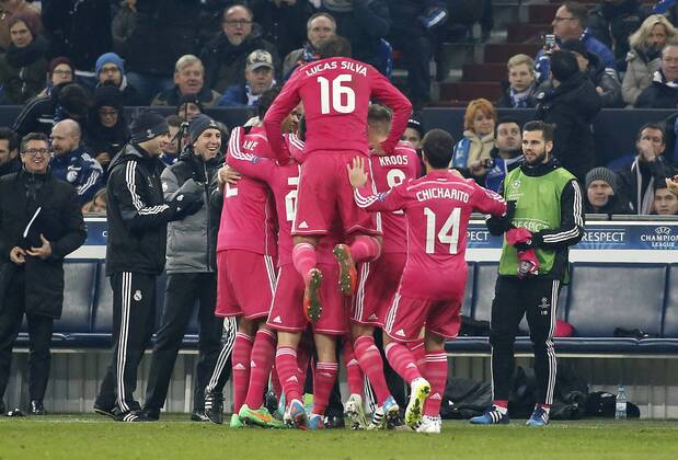 Marcelo (Real Madrid) (M) celebrates scoring the 2:0 with teammates during the Championsleague match between FC Schalke 04 and Real Madrid, Veltins Arena in Gelsenkirchen on February 18., 2015. FC Schalke 04 vs. Real Madrid im Achtelfinale der Champions League der Saison 2014 2015 am 18. Februar 2015.