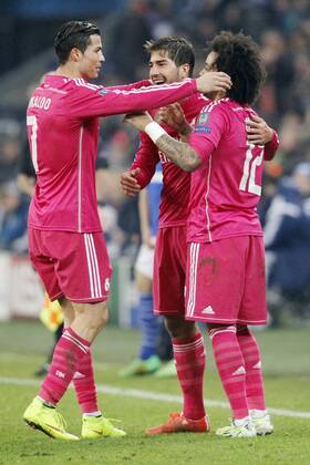 vl: Cristiano Ronaldo (Real Madrid CF 7), Lucas Silva (Real Madrid CF 16) und Torschuetze Marcelo (Real Madrid CF 12) beim Torjubel nach dem Treffer zum 2:0 FC Schalke 04 vs Real Madrid F.C., Fussball, Champions-League, 18.02.2015 , EP_JSE