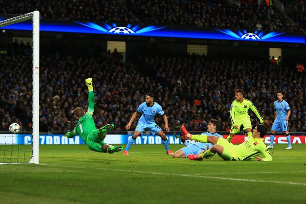Luis Suarez of Barcelona scores his sides second goal - Manchester City vs. Barcelona - UEFA Champions League - Etihad Stadium - Manchester - 25 02 2015 Pic Philip Oldham Sportimage EDITORIAL USE ONLY. No use with unauthorised audio, video, data, fixture lists, club league logos or live services. Online in-match use limited to 120 images, no video emulation. No use in betting, games or single club league player publications.